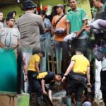Polres Jember Gelar Tindakan Cepat, Bantu Warga Terdampak Luapan Air Sungai PhotoGrid_Site_1765948850365