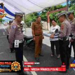 Ganggu Arus Lalu Lintas, Satlantas Polres Kotamobagu Bongkar Paksa Tenda Hajatan di Jalan Raya