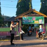 **Rawan Pagi Polsek Maluk, Hadir di Tengah Aktivitas Pelajar dan Masyarakat untuk Ciptakan Lalu Lintas Aman** IMG-20260617-WA0060