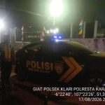 Polsek Klari Melaksanakan Strong poin Malam Hari di Depan TMP Pancawati Antisipasi Gukamtibmas