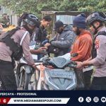 Polres Dogiyai dan TNI Gelar Patroli Gabungan, Amankan Senjata Tajam di Ugapuga dan Idakebo